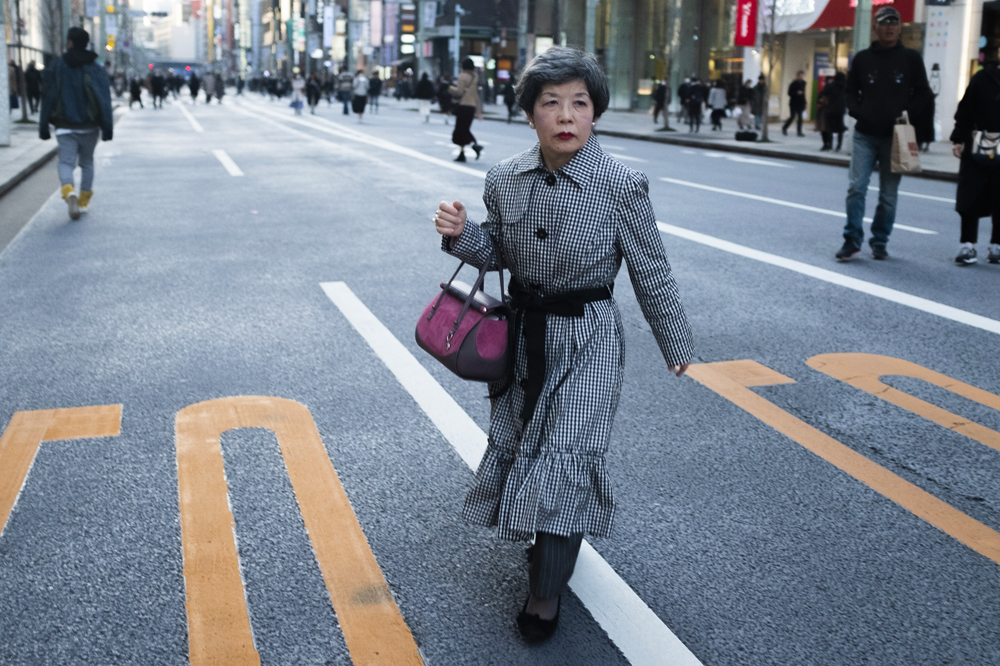Well_dressed_elderly_japanese_woman japanese woman walking accross street