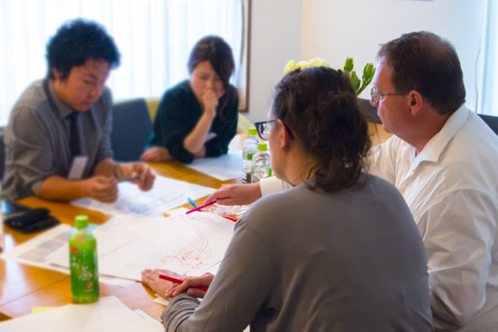 Group_clients_workshop_1 group around table